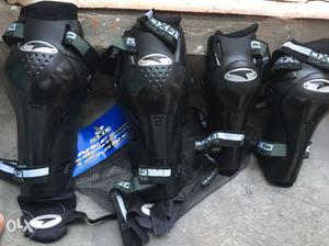 Pair Of Black Knee Pads And Elbow Pads