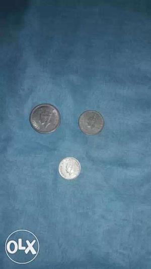 Round Three Silver Coins