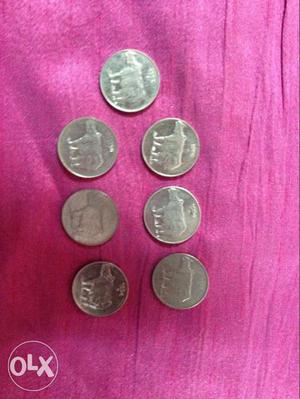 Seven 25 Paise Coins