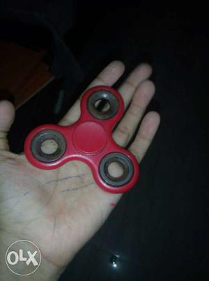 Spinner in red colour