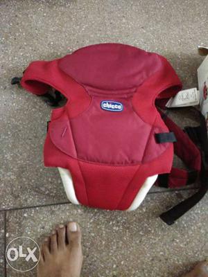 Baby's Red Chicco Strap Carrier