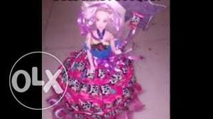 Barbie Doll In Pink And Purple Sleeveless Ball Gown