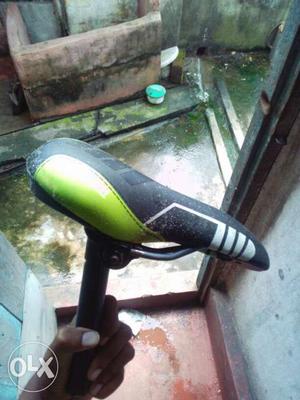 Black And Green Bicycle Seat