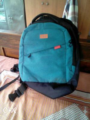 Black And Teal Backpack