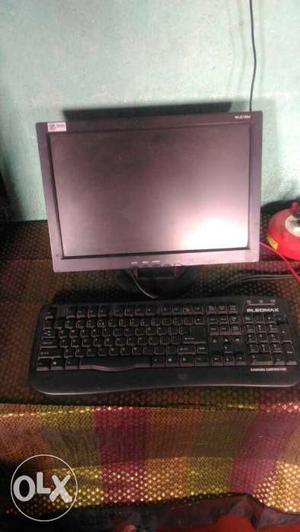 Black Flat Screen Computer Monitor With Keyboard