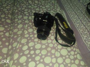 Black Nikon DSLR Camera