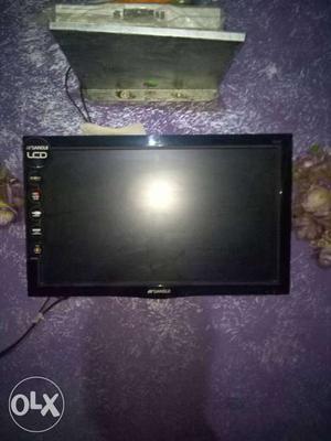 Black Wall-mounted Flat Screen TV