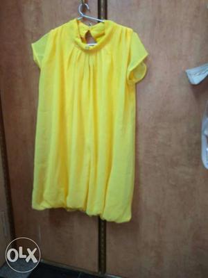 Entire set (2tops+1 pink pant)= Rs 600 yellow