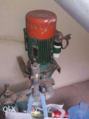 Green And Orange Water Pump