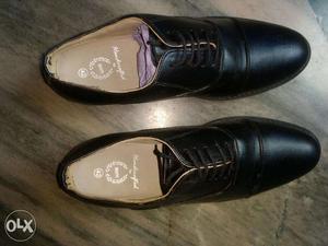 It's a brand new black Oxford shoe, shoes size-8,