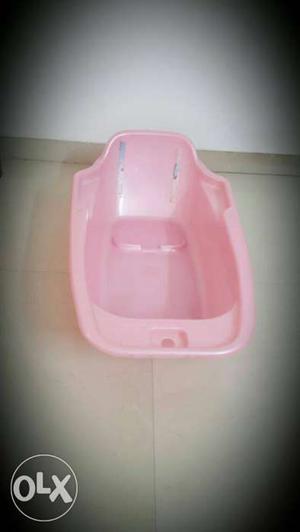 Mee Mee baby bath tub with nonslippery arrangement.