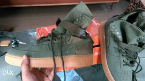 Pair Of Gray-and-brown Nike High Top Sneakers\