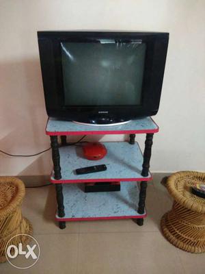 Samsung flat. screen TV with stand and stabilizer