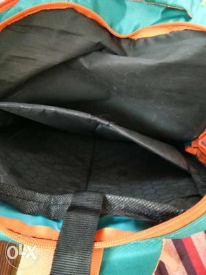 Teal And Orange Backpack