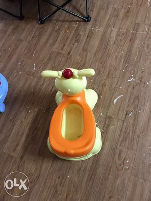 Toddler's Orange And Yellow Potty Trainer