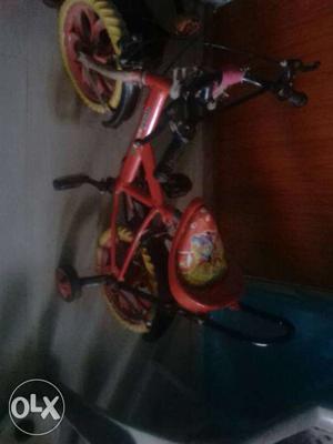 Toddler's Red Bicycle With Trainer Wheels