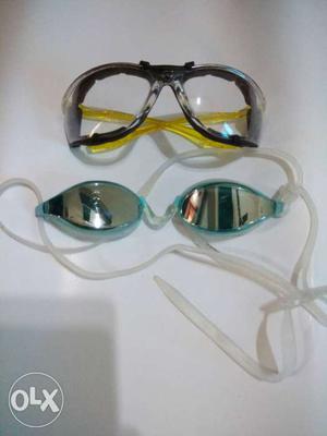 Two Black And Blue Swimming Goggles