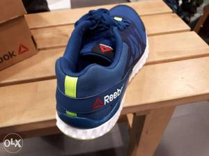 Unpaired Blue Reebok Shoe