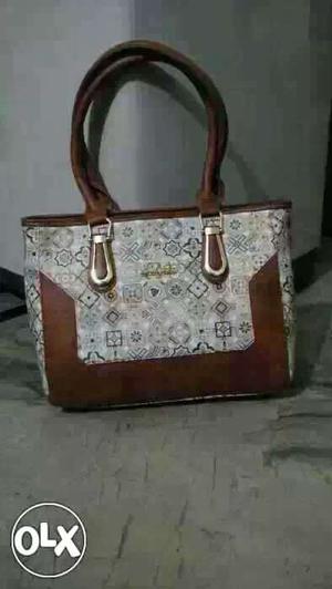 White And Brown Leather Handbag