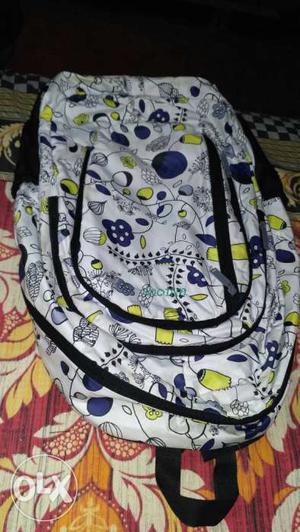White, Yellow And Blue Backpack