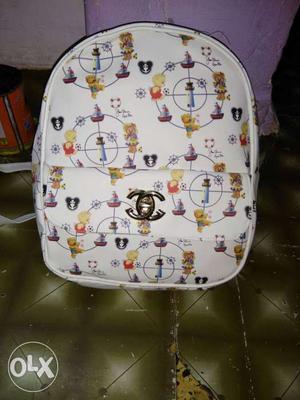 White, Yellow, Red, And Brown Chanel Backpack