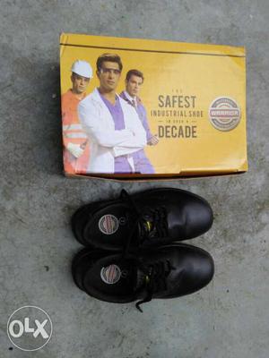 7 No. Pair Of Black Leather Seafty Shoes One time used