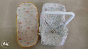 Baby bath seat and carry cot. Each for 600/-