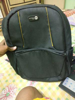 Black And Yellow Dell Backpack