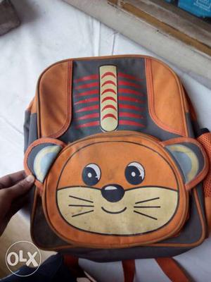 Brown, Black And Red Backpack