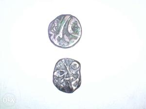 Two Gray And Black Coins