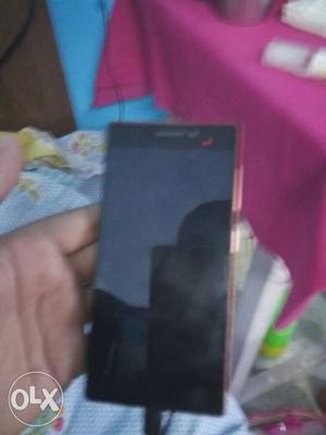 Lenovo 4G phone with charger and headphones. 2GB