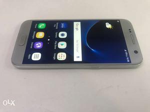 Samsung s7 silver 6 months old with all accessories.