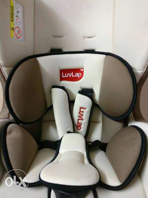 White And Gray Luvlap Baby Car Seat.