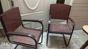 2 brown steel armchairs in good condition