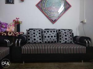 5 seated luxurious sofa with comfortable cushions