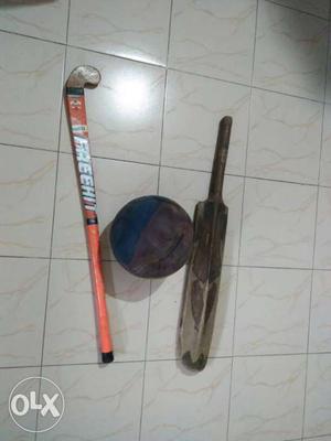 A New Hockey stick, a basket ball and a cricket