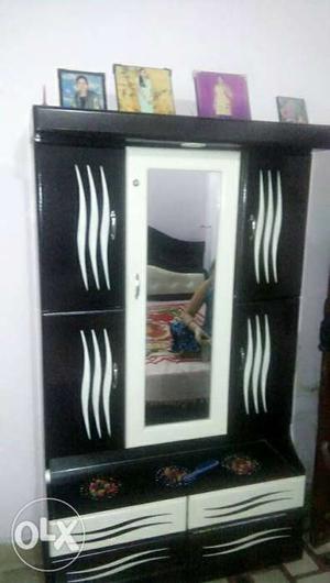 Black And White Wooden Dresser With Mirror