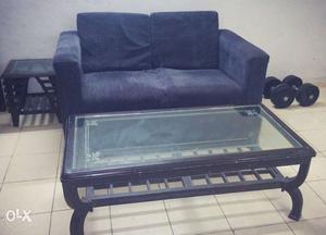 Black two seater sofa with one no.table and side
