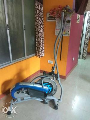 Blue, Gray, And Black Elliptical Trainer