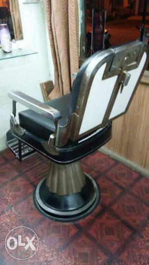 Both of black and white and black barber chair at 