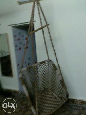 Brown And White Rattan Hanging Chair