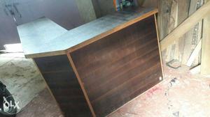 Brown Wooden Sectional Receptionist Desk.