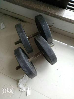 Complete gym set with long rods, and plates of