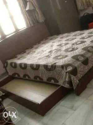 Double Bed with Ample storage space and 5" mattress.