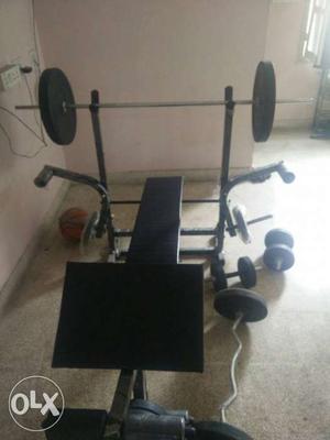 Fitness Bench along with 50kg weights in very