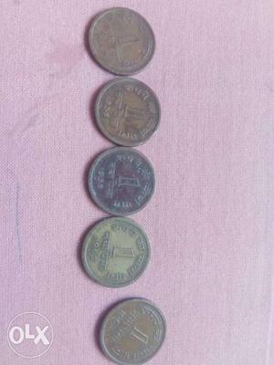 Five 1 Rupee Coins