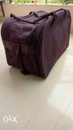 Magenta color high quality traveling bag brand new