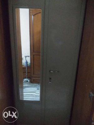 Metal Cupboard with a mirror and a safe locker