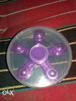 Purple Hand Spinner On Round Clear Case