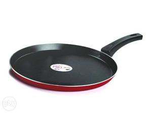 Red And Black Handled Frying Pan